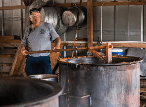 man working with barrel