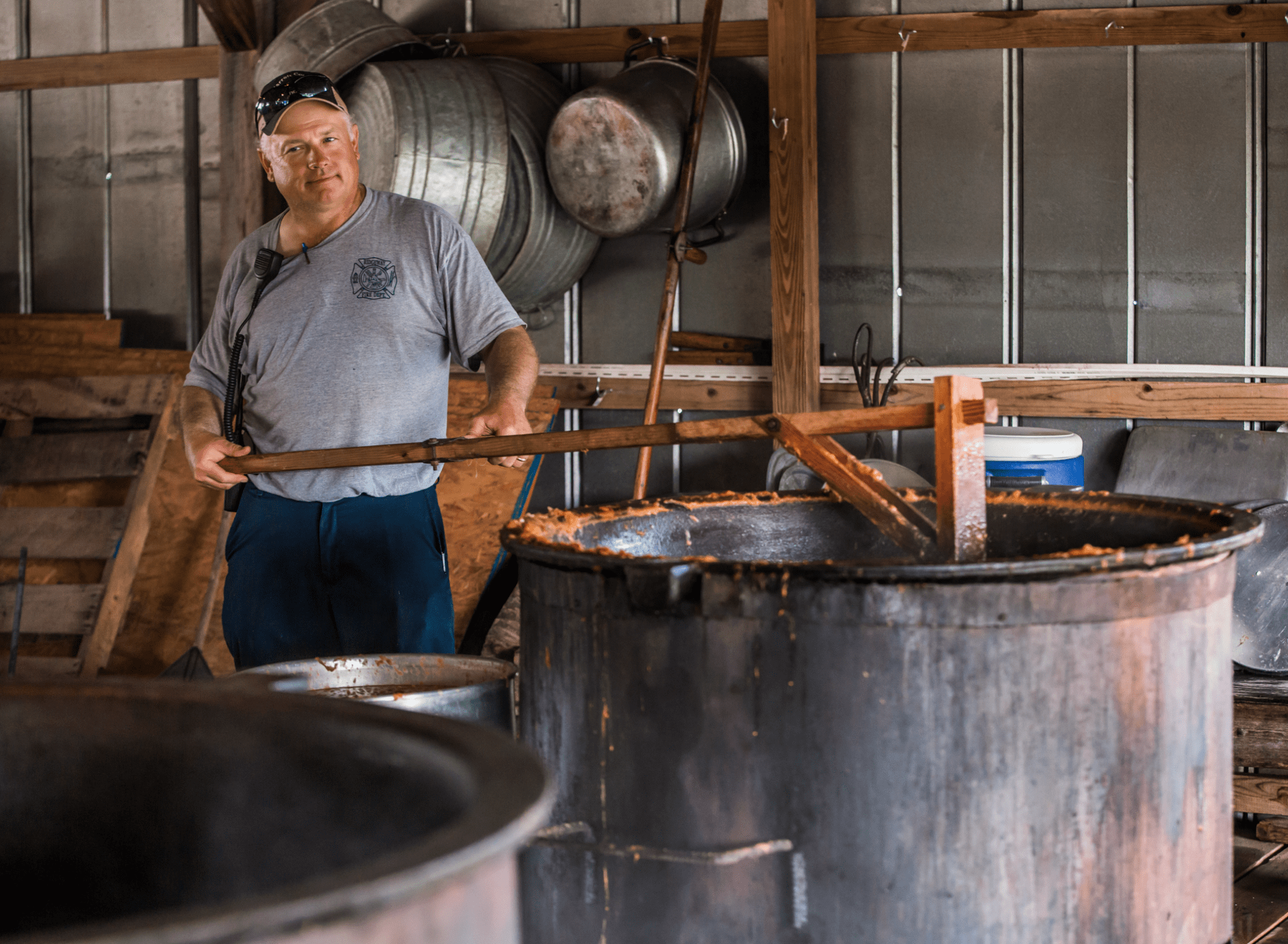 man working with barrel