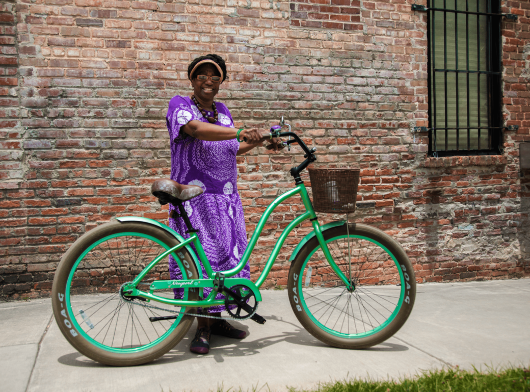 Resident cycles around downtown Warrenton on her beach cruiser bicycle